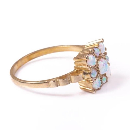 13 - 18ct silver-gilt opal (0.60ct) ring