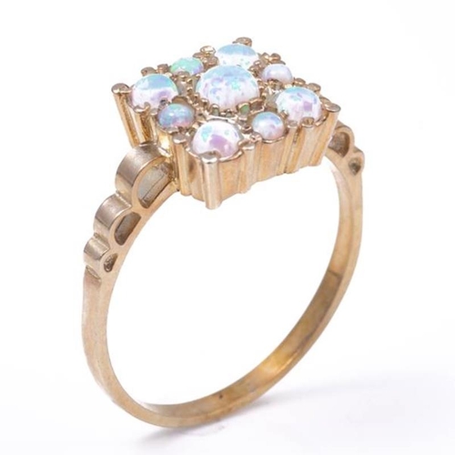 13 - 18ct silver-gilt opal (0.60ct) ring