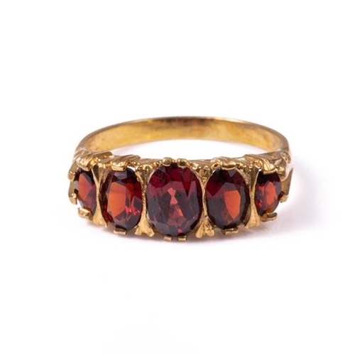 24 - 18ct silver-gilt garnet (2.80ct total) ring