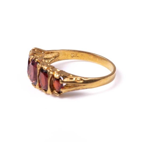 24 - 18ct silver-gilt garnet (2.80ct total) ring