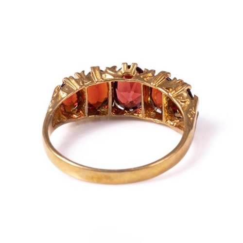 24 - 18ct silver-gilt garnet (2.80ct total) ring