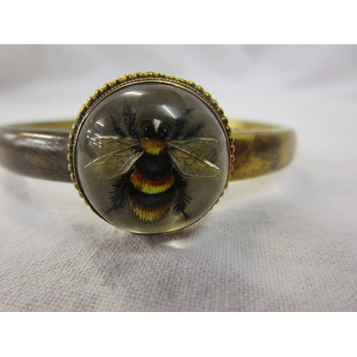 123 - Bangle set with bumble bee motif