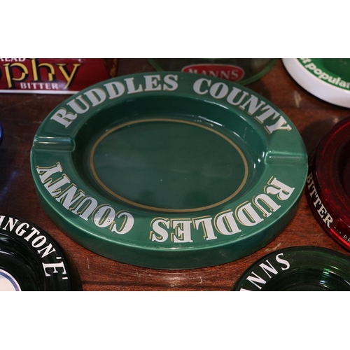 128 - Collection of pub advertising ashtrays