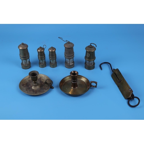 184 - Brassware to include miniature minors lamps