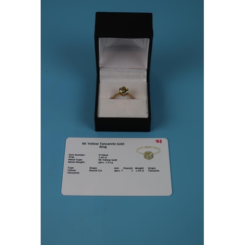 44 - Gold solitaire ring set with yellow Tanzanite (with certificate)