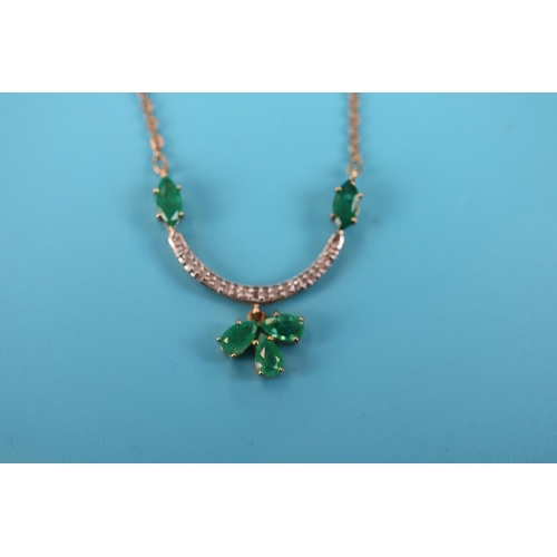 45 - Gold emerald & diamond necklace