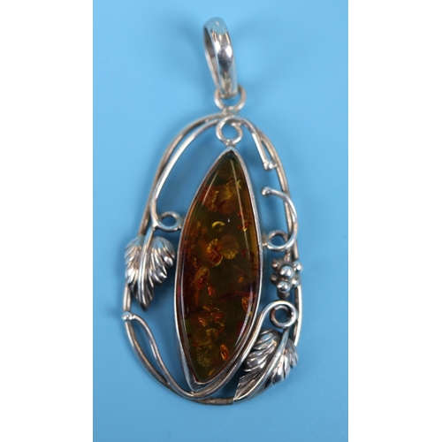 47 - Silver & amber pendant