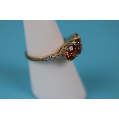 50 - Gold ring set with orange zircon & diamond (with certificate)