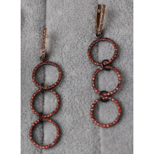 53 - Pair of triple loop diamond & red stone earrings