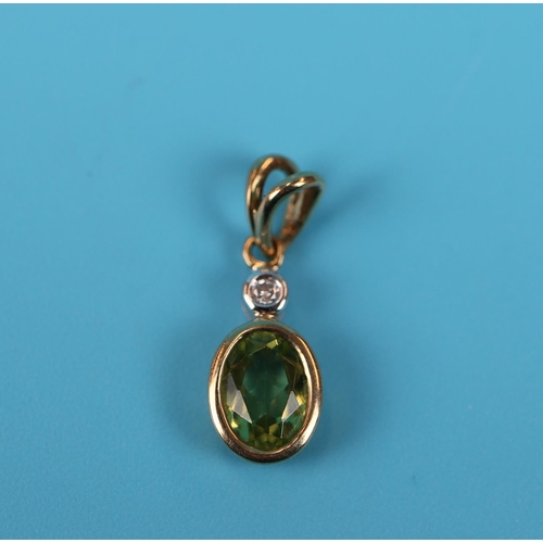 58 - Gold peridot & diamond pendant