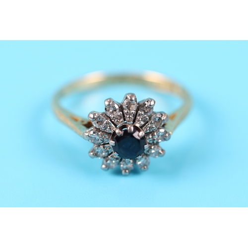 48 - 18ct sapphire & diamond cluster ring