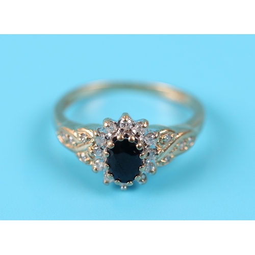 52 - Gold sapphire & diamond cluster ring