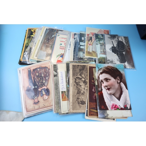 76 - Large collection of postcards