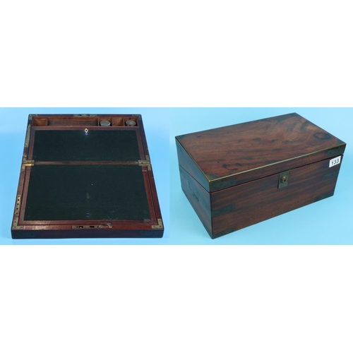 133 - Brass bound mahogany writing slope with secret drawers and interior key