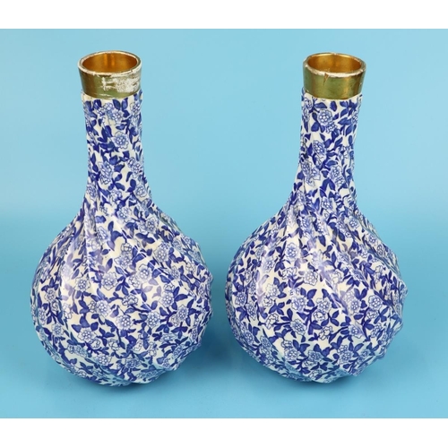 152 - Pair of blue & white twisted vases - A/F - Approx H: 30cm