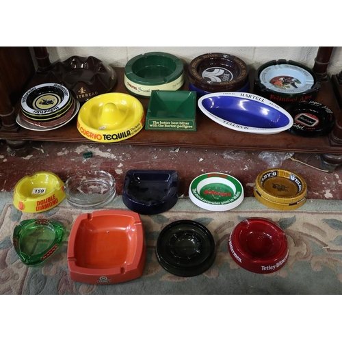 159 - Shelf of pub advertising ashtrays