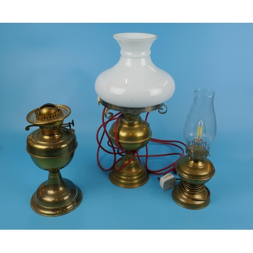 192 - 2 converted oil lamps and another oil lamp