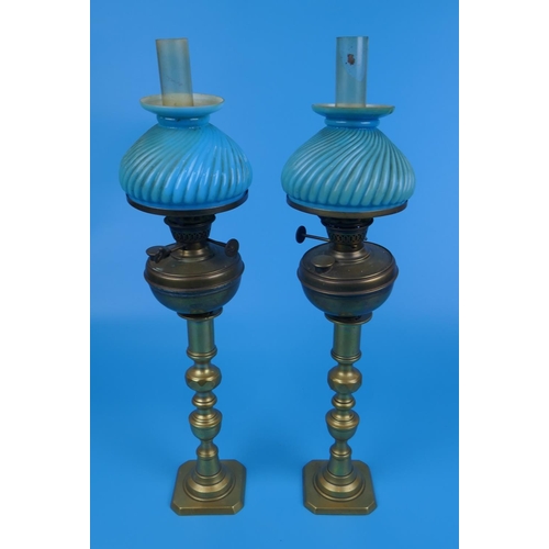 226 - Pair of candlesticks with antique oil lamp fittings