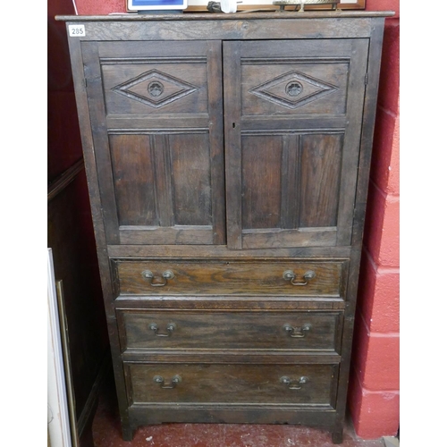 285 - Tall oak cabinet