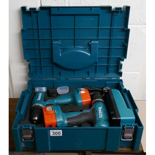 300 - 2 cased Makita cordless drills