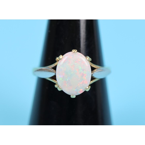 64 - Large opal hallmarked 18 carat gold ring