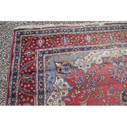 496 - Large Eastern patterned rug - Approx 303cm x 380cm