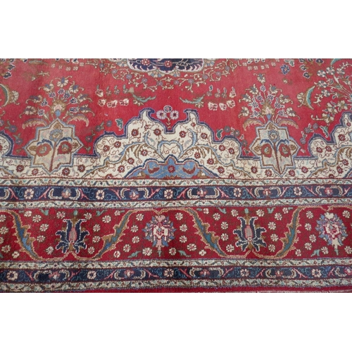 496 - Large Eastern patterned rug - Approx 303cm x 380cm