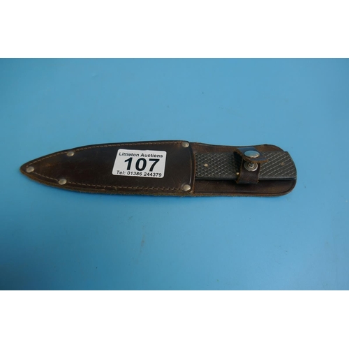 107 - Truflite throwing knife in leather sheath