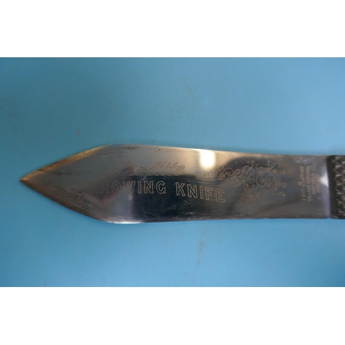 107 - Truflite throwing knife in leather sheath