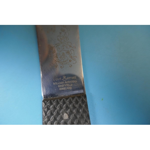 107 - Truflite throwing knife in leather sheath