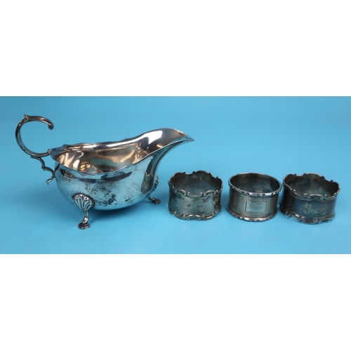 19 - Hallmarked silver cream jug together with 3 hallmarked silver napkin rings - Approx weight 153g