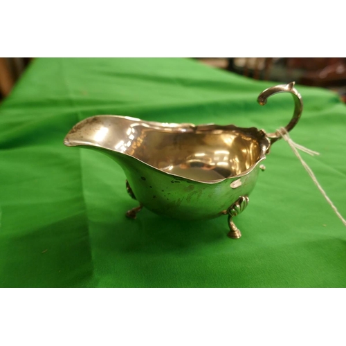 19 - Hallmarked silver cream jug together with 3 hallmarked silver napkin rings - Approx weight 153g