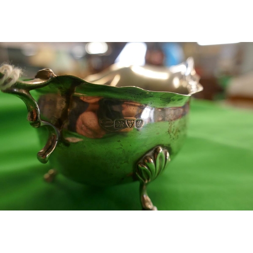 19 - Hallmarked silver cream jug together with 3 hallmarked silver napkin rings - Approx weight 153g