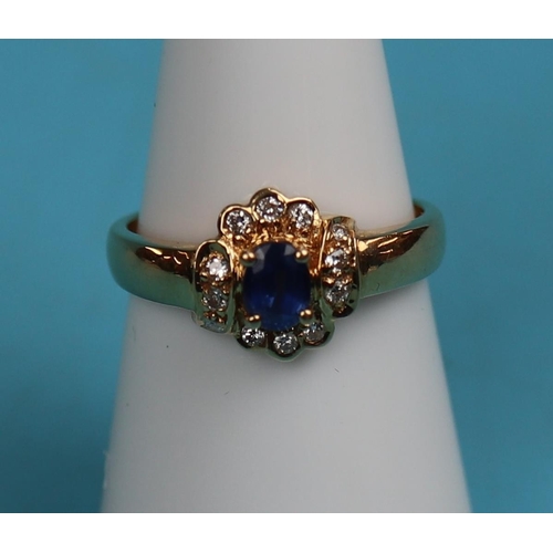 49 - 18ct gold diamond & sapphire cluster ring