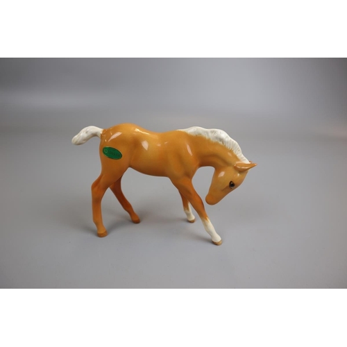 151 - Horses & hounds to include Beswick