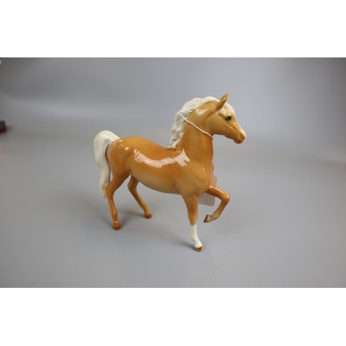 151 - Horses & hounds to include Beswick