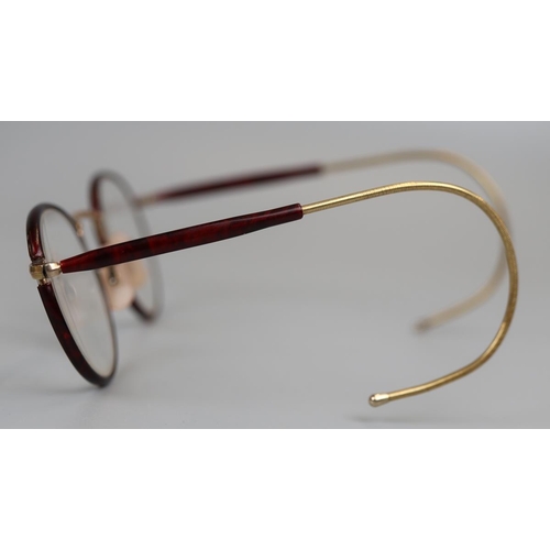 21 - Interesting pair of bifocal spectacles in case - Possibly gold mounted