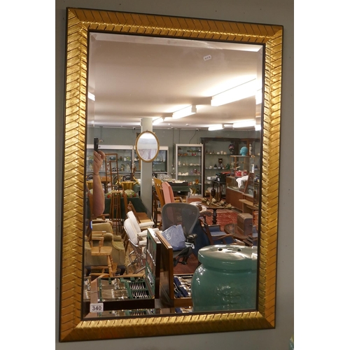 340 - Bevelled glass mirror