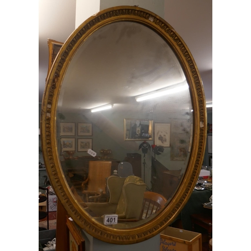 401 - Oval antique bevelled glass mirror