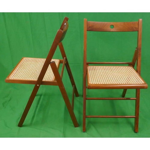 411 - Pair of folding bergère seated chairs