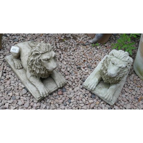 468 - Pair of stone sitting lions