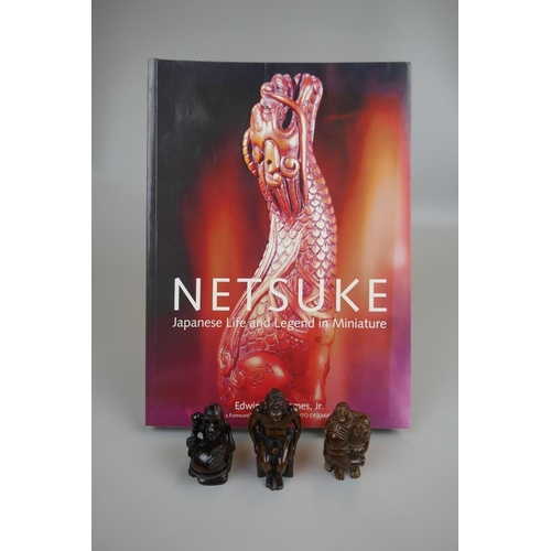 78 - 3 wooden Netsukes & Netsuke collectors book