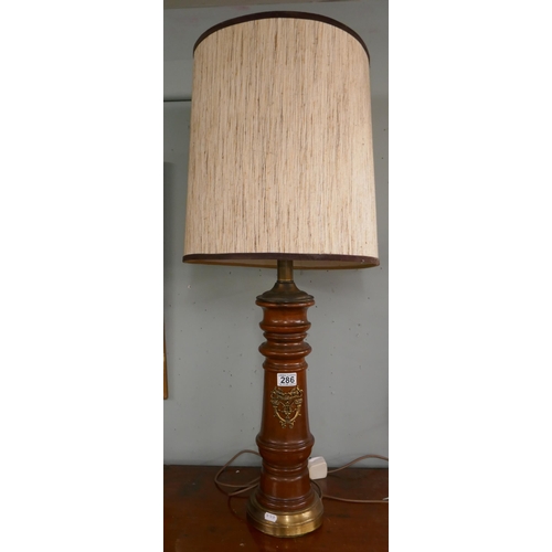 286 - Unusual turned table lamp with ormolu crest