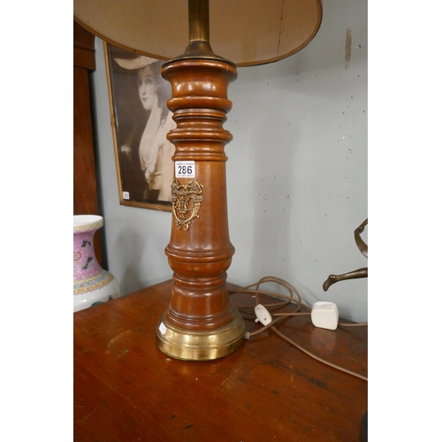 286 - Unusual turned table lamp with ormolu crest