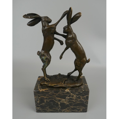 297 - Bronze on marble base - Boxing hairs - Approx H: 24cm