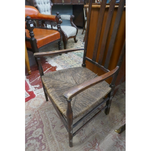 308 - Antique slat back rush seated armchair