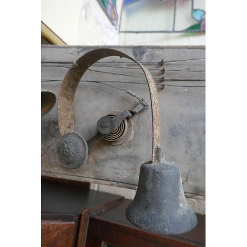 313 - 7 antique servants bells mounted on wood