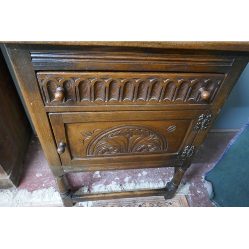 325 - Carved oak cabinet