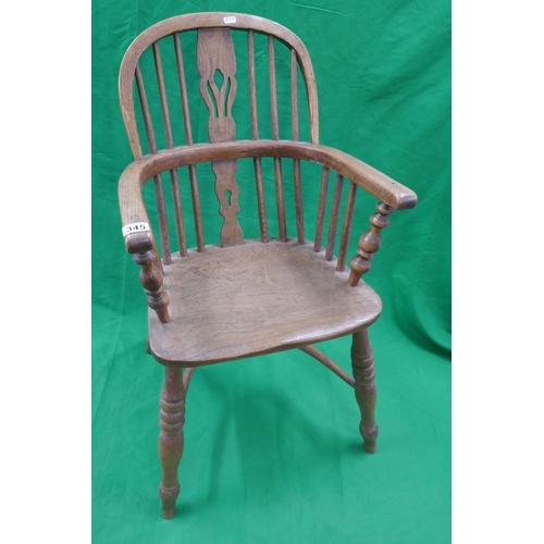 345 - Antique elm seated stick back armchair