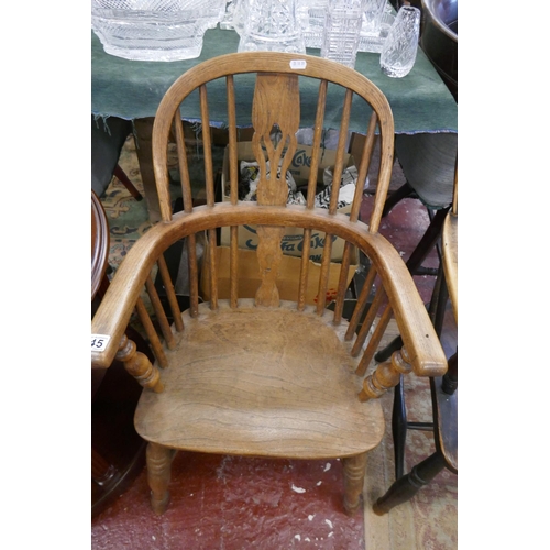 345 - Antique elm seated stick back armchair